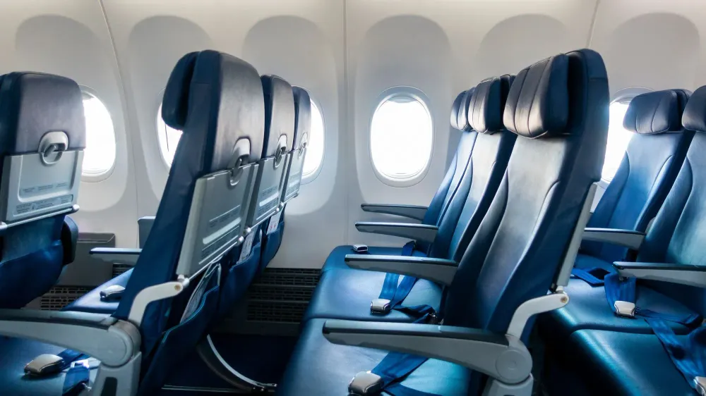 Empty rows of airplane seats